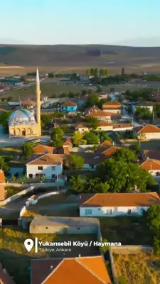 Gün batımında köy ve camii